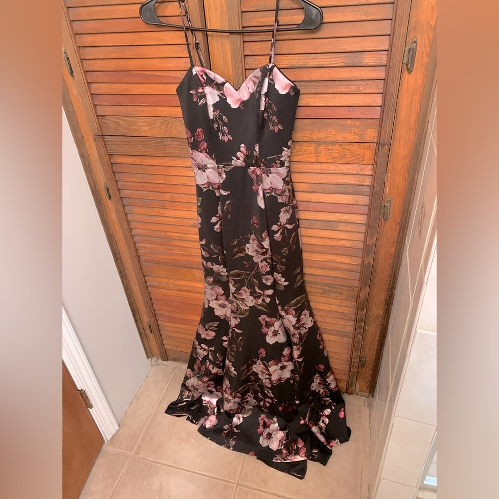 Black dress with metallic floral print.
